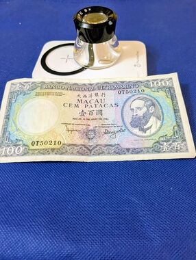 Macau 100 Patacas 1984 – Banco Nacional Ultramarino (BNU) – Pick #61 – Serial QT